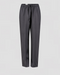 Mørke bukser med løstsiddende pasform, snoretræk i taljen, lige ben og elastiske manchetter.